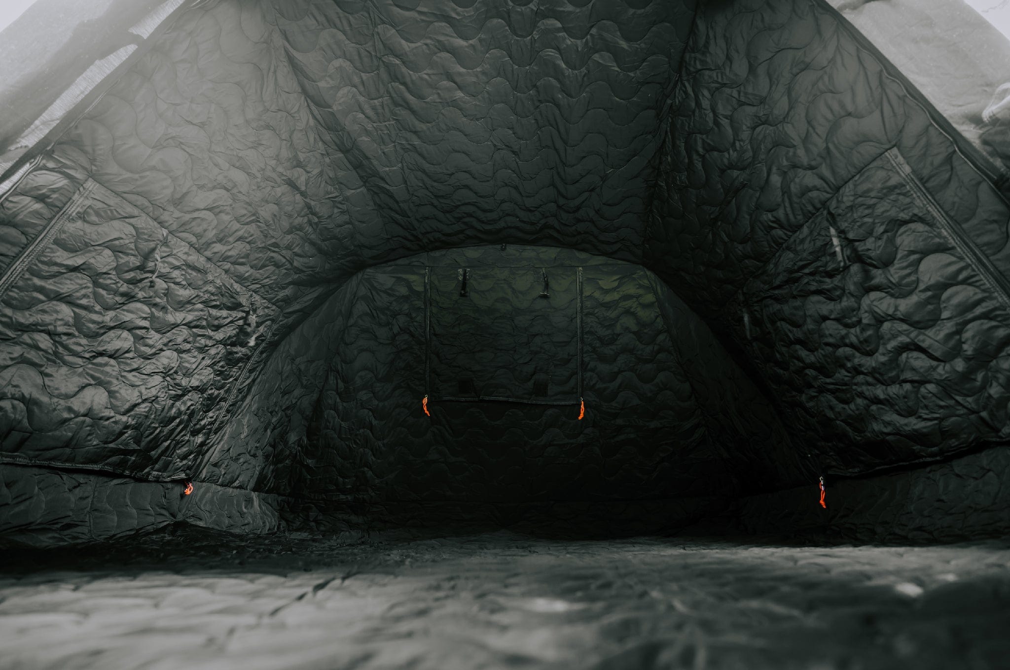 Interior view of the Crua Tri insulated tent bedroom, showing plush walls and thermal lining.