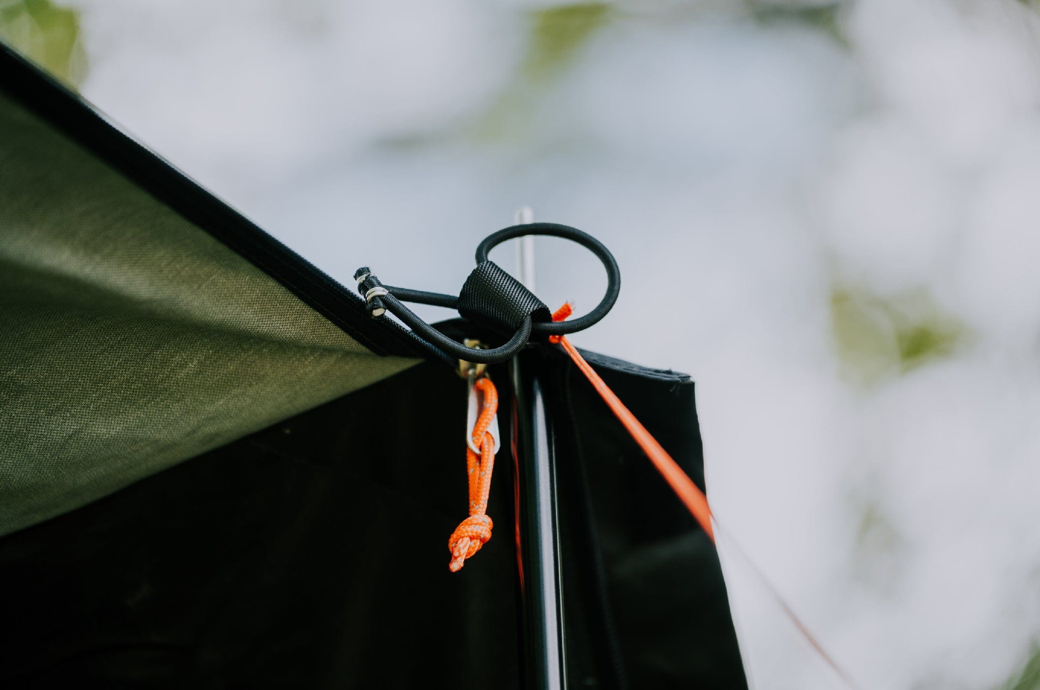 Close-up of the Crua Tri tent porch pole, emphasizing sturdy design and weather-resistant build.